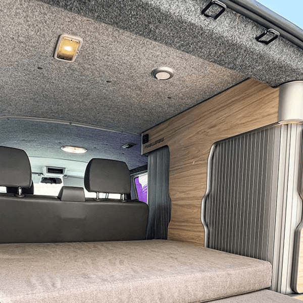 Campervan interior lined with carpet felt. Flexible textile lining in colours silver and smoke(Avon, Compass or Hi-Flex)