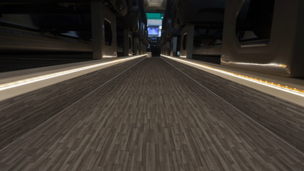 PVC Vinyl flooring with wood effect for camper, motorhome, bus or any kind of vehicle. Decor-Wood Chaffinch pattern in Bus corridor